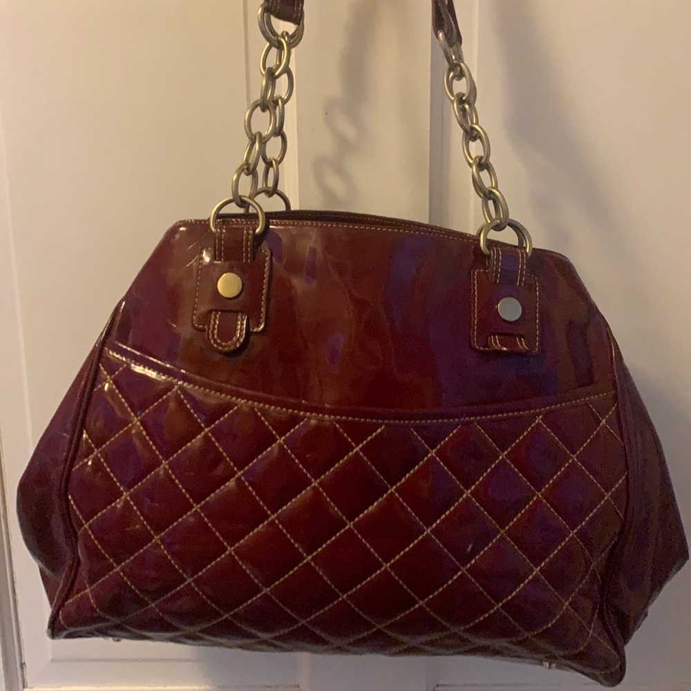 Burgundy MAXX New York signature handbag